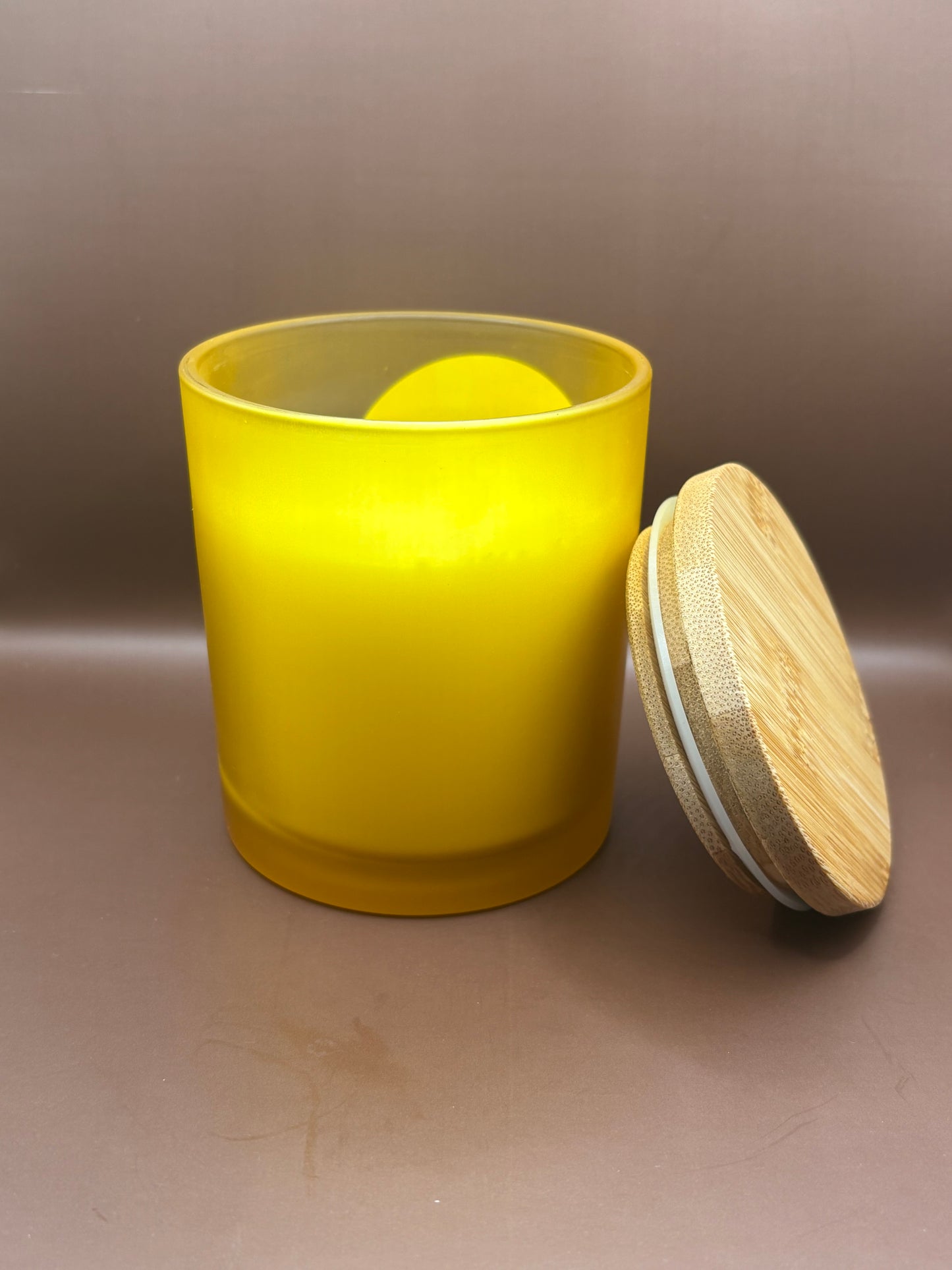 Scented 7oz Soy Wax Candles In A Frosted Yellow Glass Candle Jar.