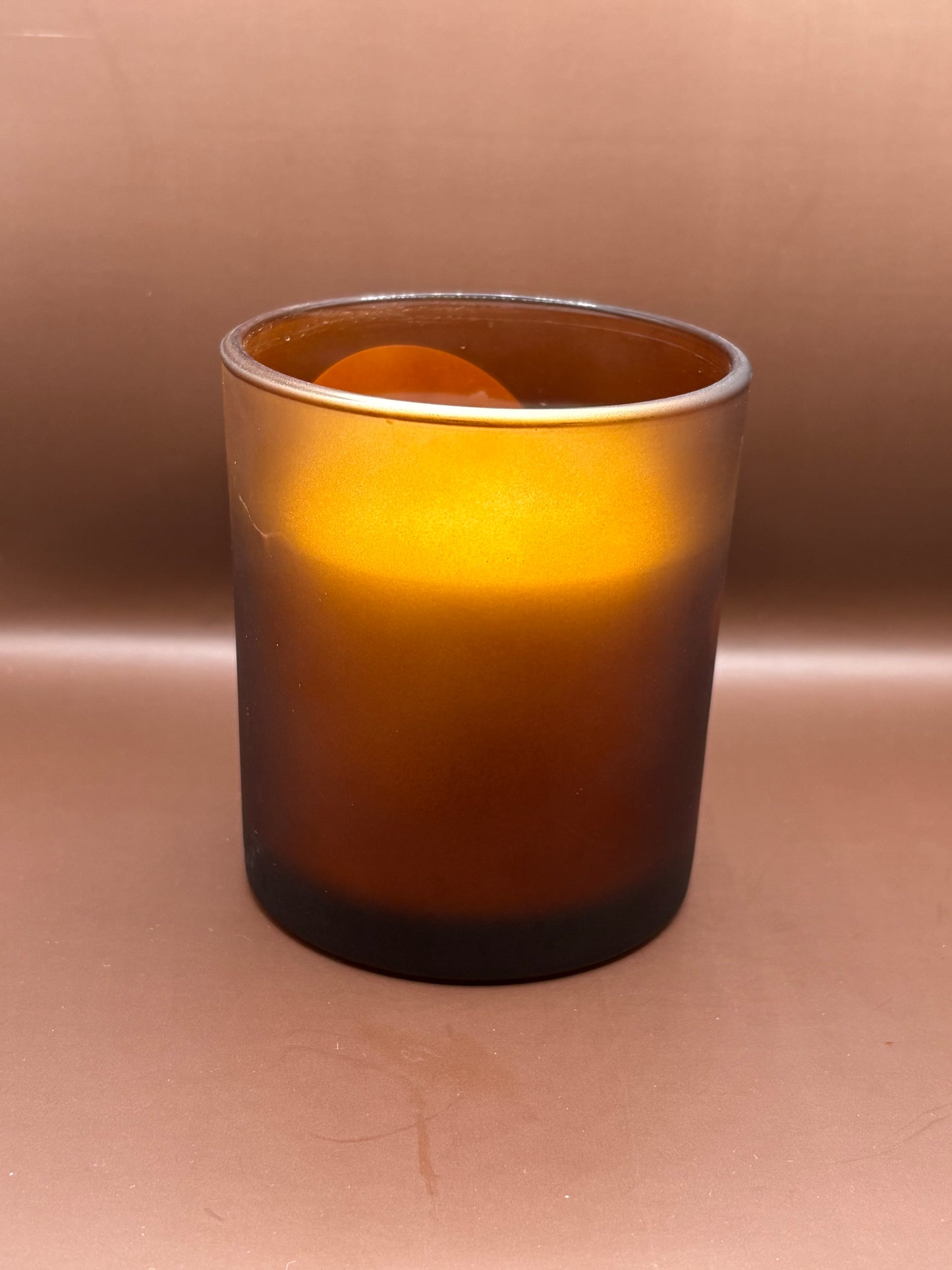 Scented 7oz Soy Wax Candles In A Frosted Brown Glass Candle Jar.