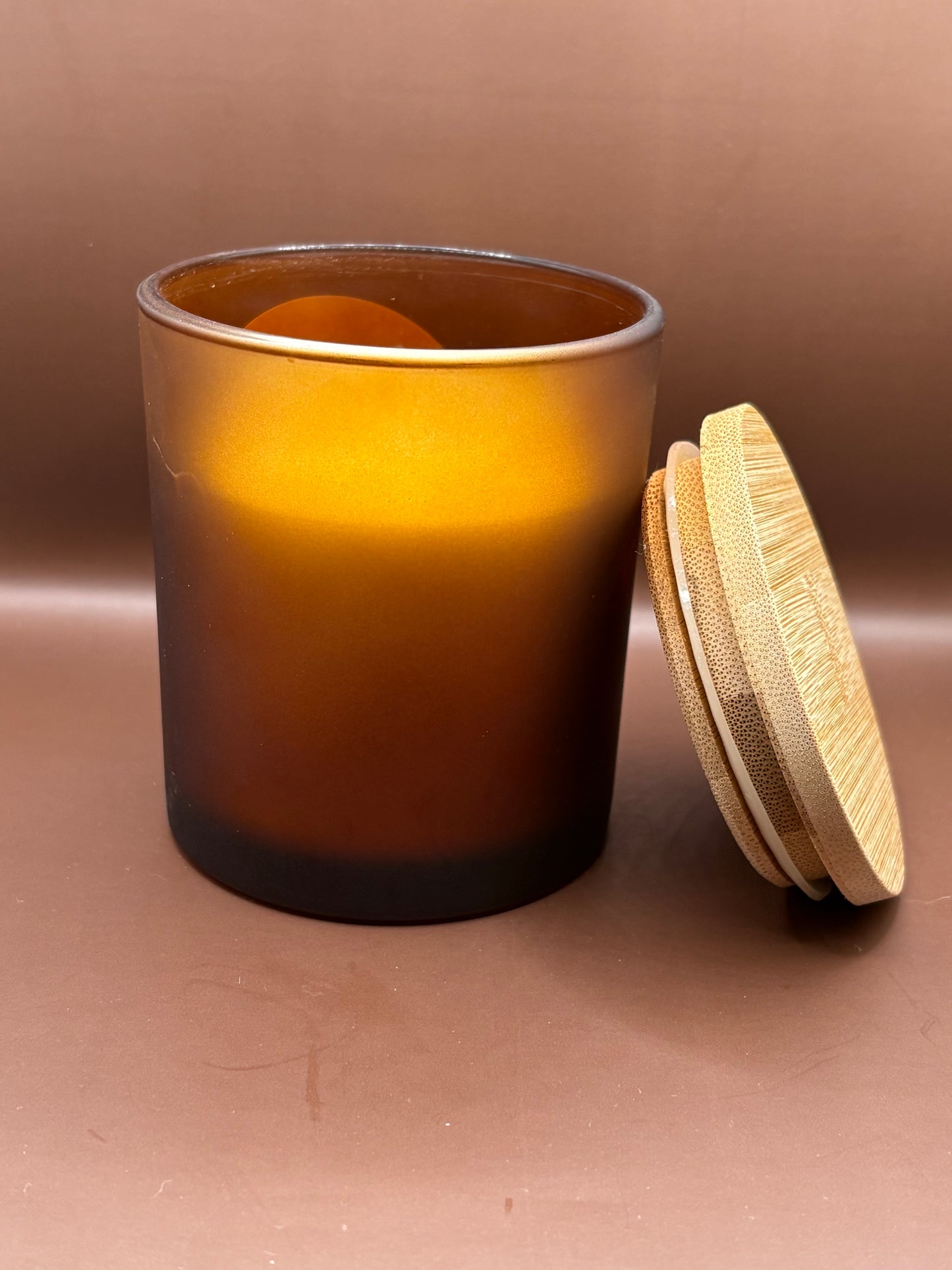 Scented 7oz Soy Wax Candles In A Frosted Brown Glass Candle Jar.