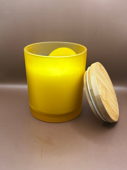 Scented 7oz Soy Wax Candles In A Frosted Yellow Glass Candle Jar.
