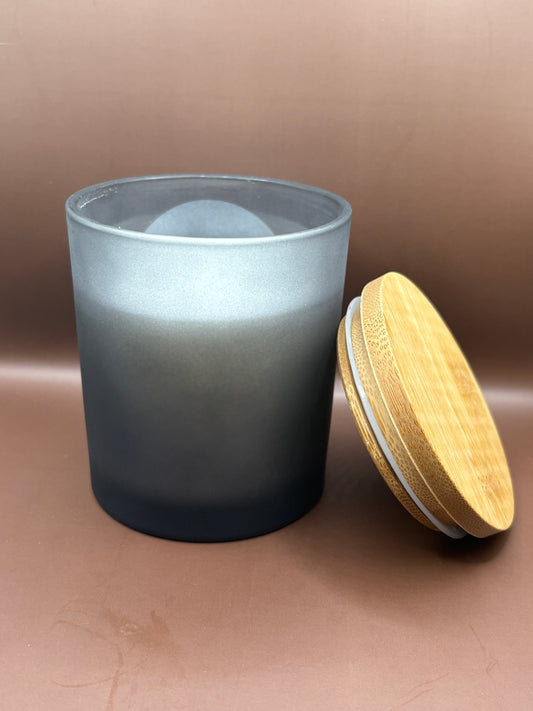 Scented 7oz Soy Wax Candles In A Frosted Black Glass Candle Jar.