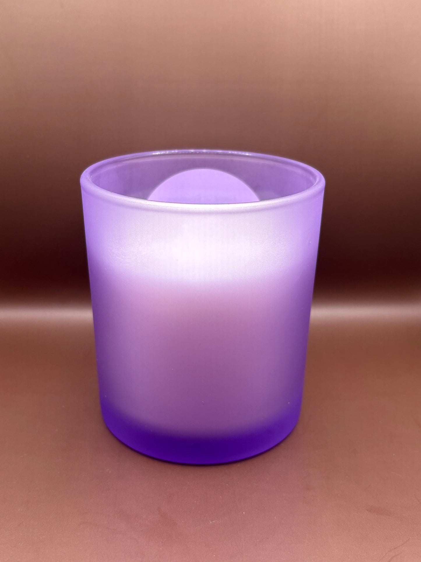 Scented 7oz Soy Wax Candles In A Frosted Purple Glass Candle Jar.